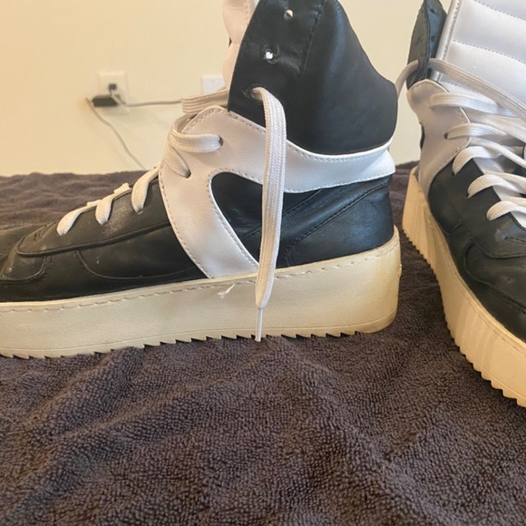 A pair of used sneakers. - Picture 2 of 7